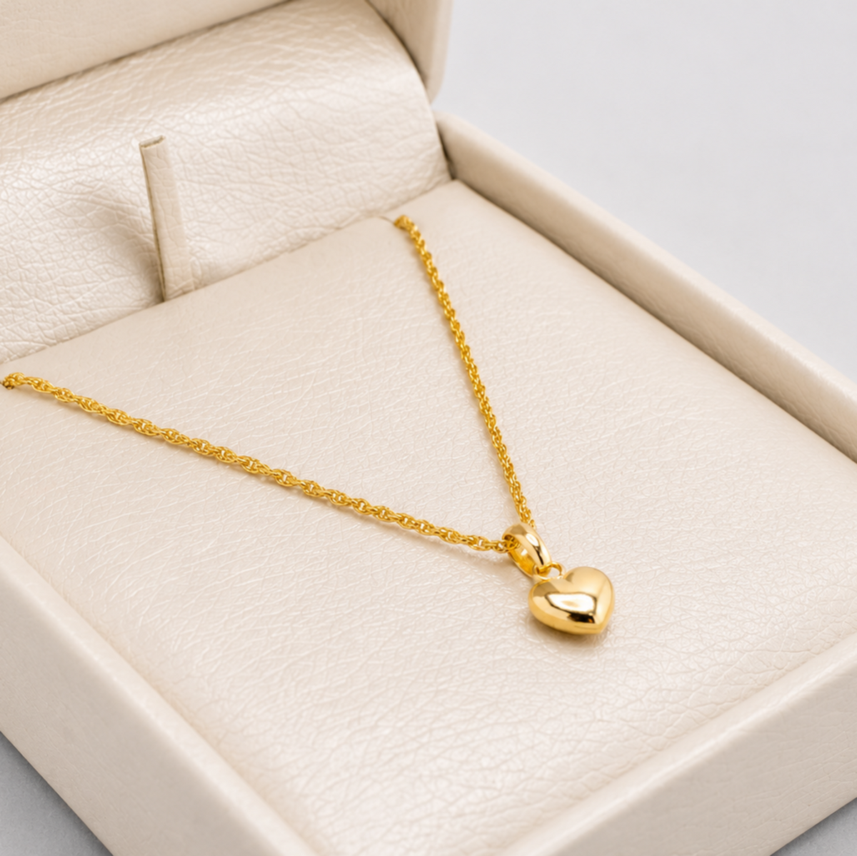 Set Cadena Mini Lazo + Dije Corazón Liso - Oro Amarillo 18K