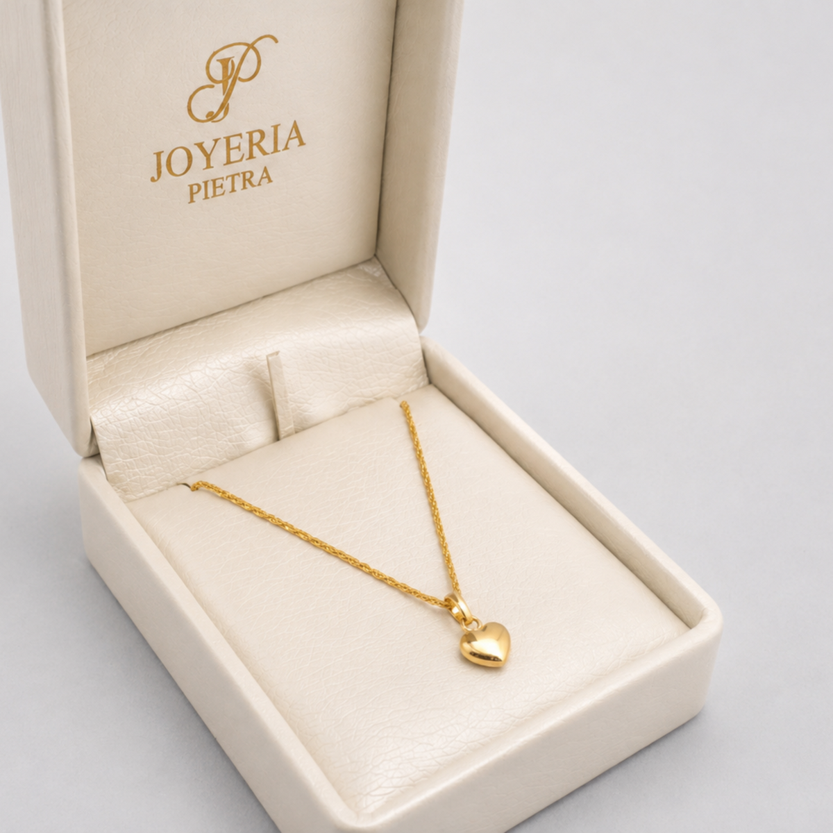 Set Cadena Mini Lazo + Dije Corazón Liso - Oro Amarillo 18K