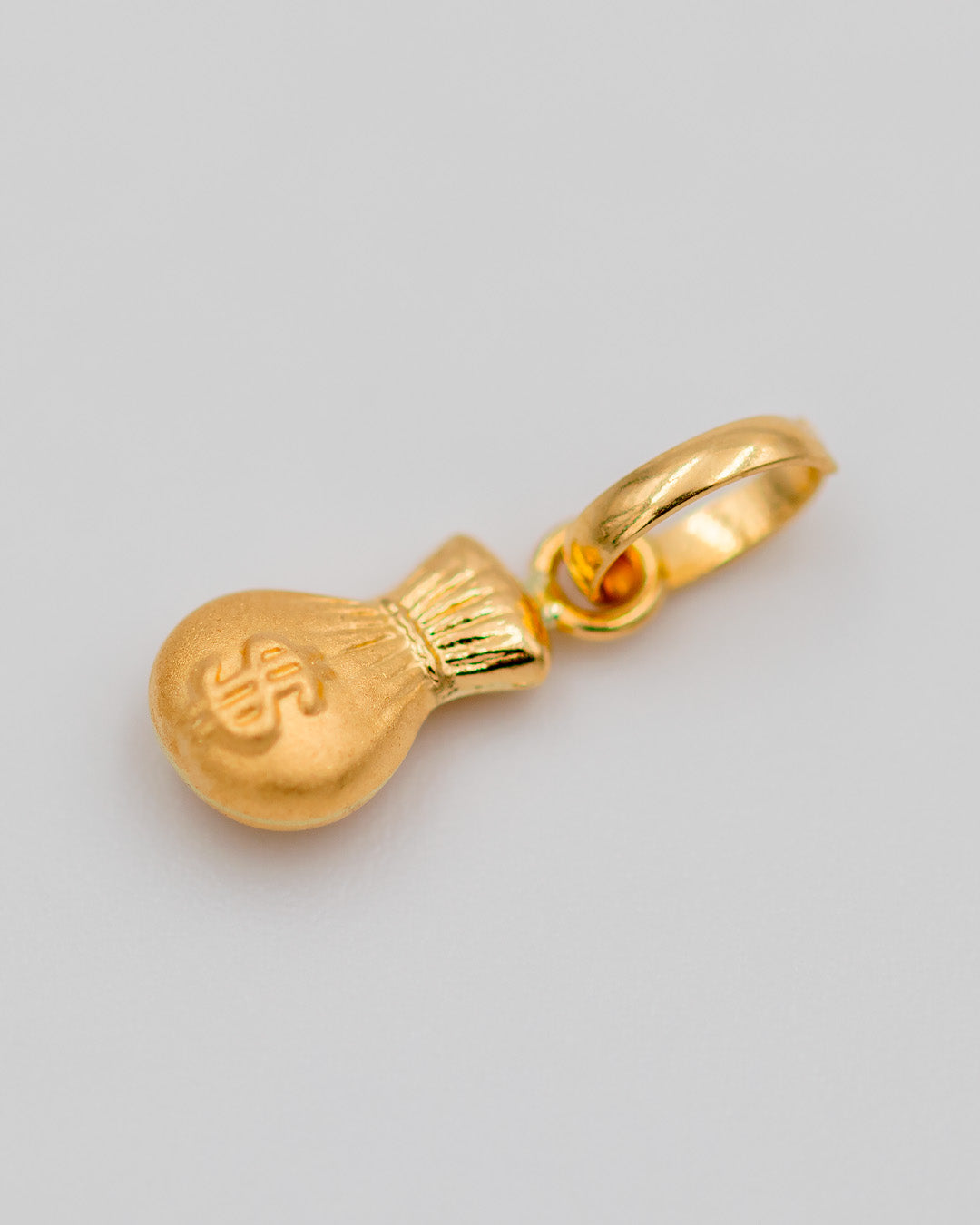Dije Bolsa De Dinero Toquelada, Oro Amarillo 18k - 0,3 gr