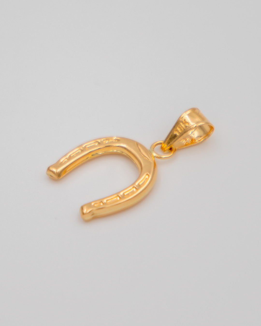 Dije Herradura, Oro Amarillo 18k - 0,65 gr