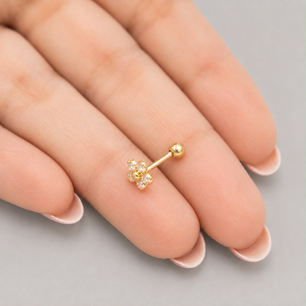 Piercing Flor Pequeña Circón Blanco - Oro Amarillo 18k