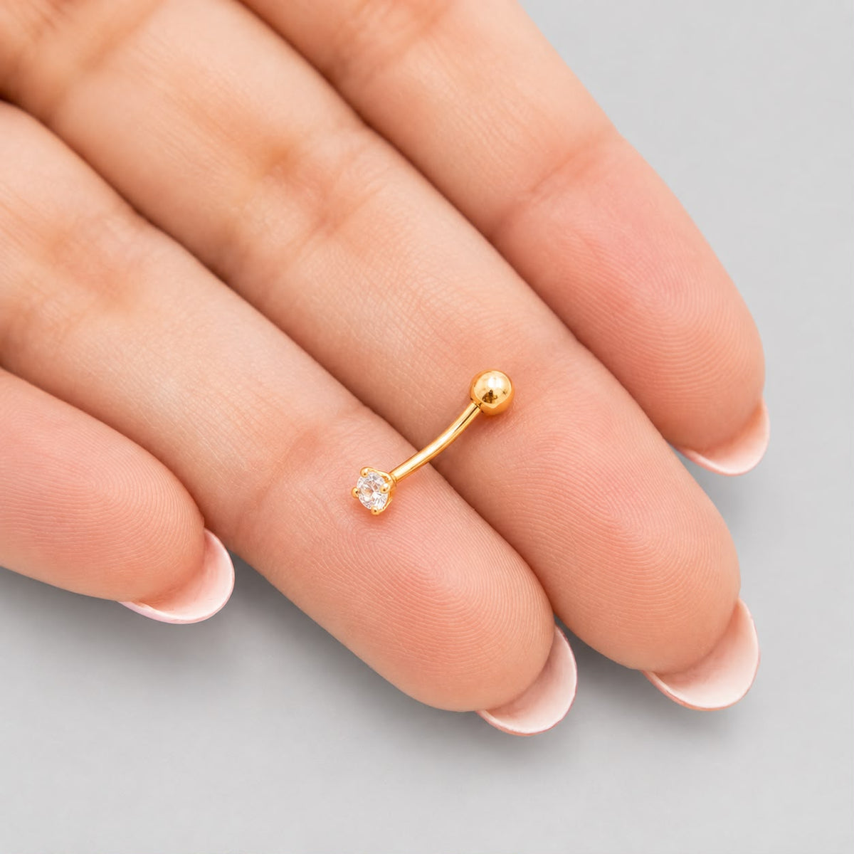 Piercing Ceja Circón Blanco  - Oro Amarillo 18k
