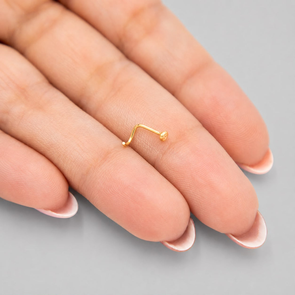 Piercing Nariz Bisel Circón Blanco Curvo - Oro Amarillo 18k